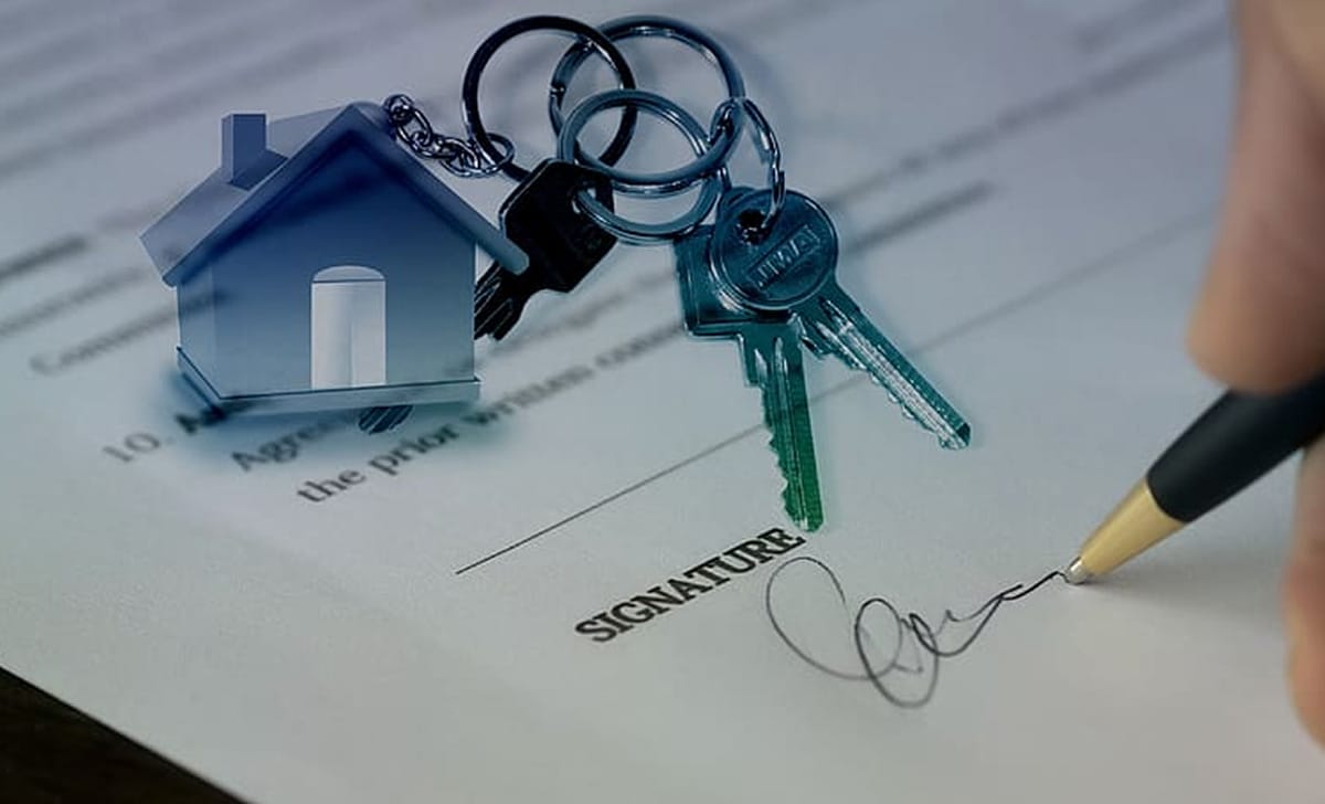 Firma del contratto di acquisto di una casa