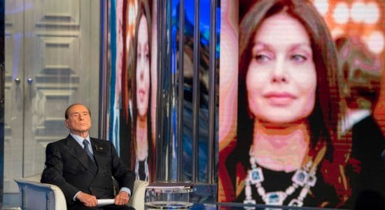Silvio Berlusconi e nello sfondo Veronica Lario-Foto da imagoeconomica